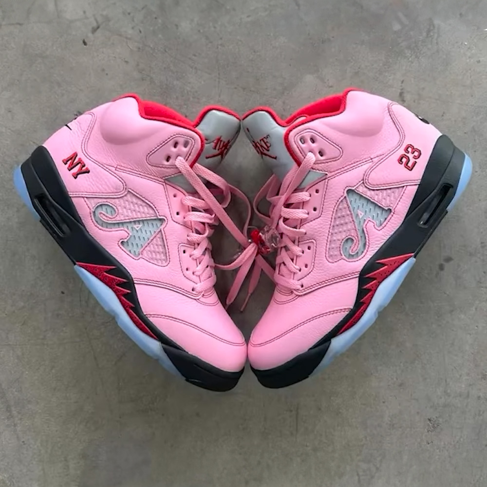 Side-by-side image of the Awake NY x Air Jordan 5 Arctic Pink, showcasing pink leather upper and unique branding details.