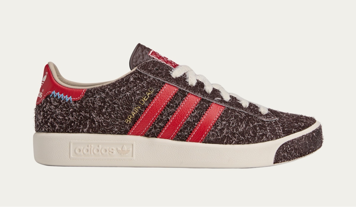 Brain Dead x adidas Forest Hills in dark brown fuzzy suede with red stripes.