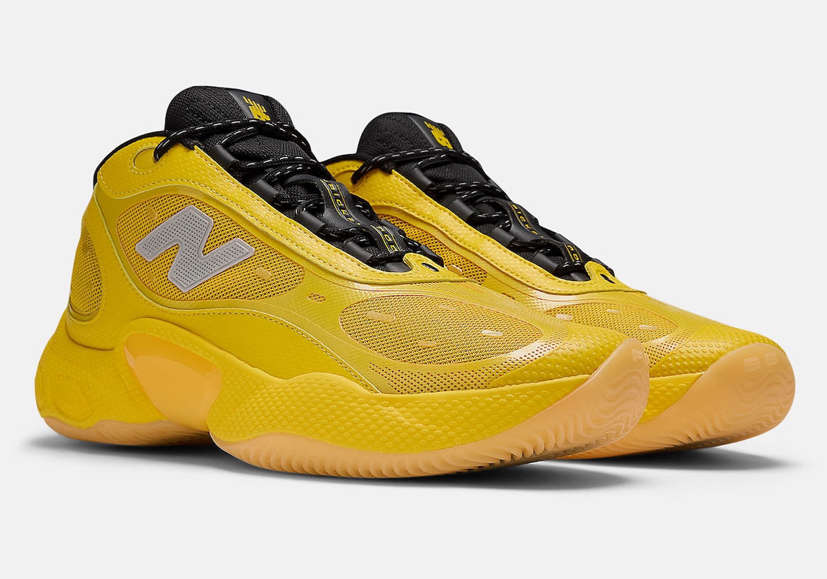 Bricks & Wood x New Balance Fresh Foam BB v3 sneaker in bright yellow with black laces and a grey "N" logo.