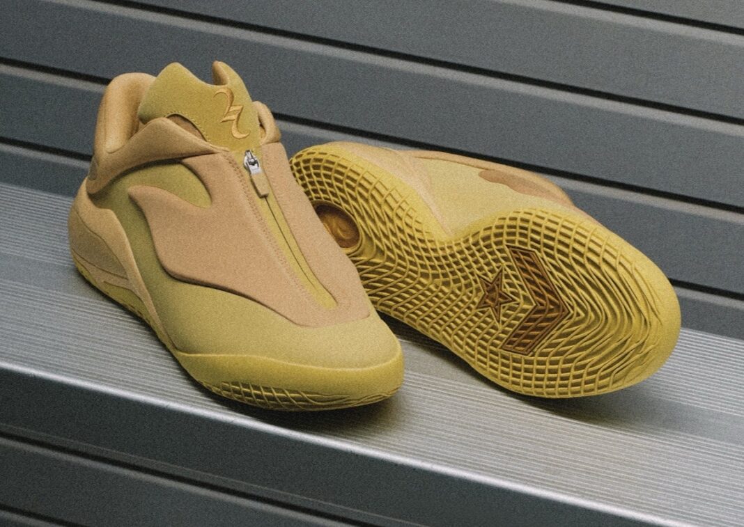 A close-up of the Converse SHAI 001 in its debut yellow colorway, featuring a zippered upper.