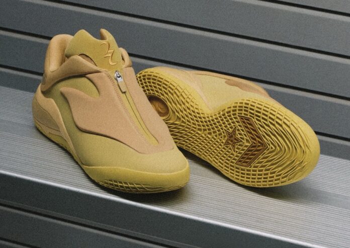 A close-up of the Converse SHAI 001 in its debut yellow colorway, featuring a zippered upper.