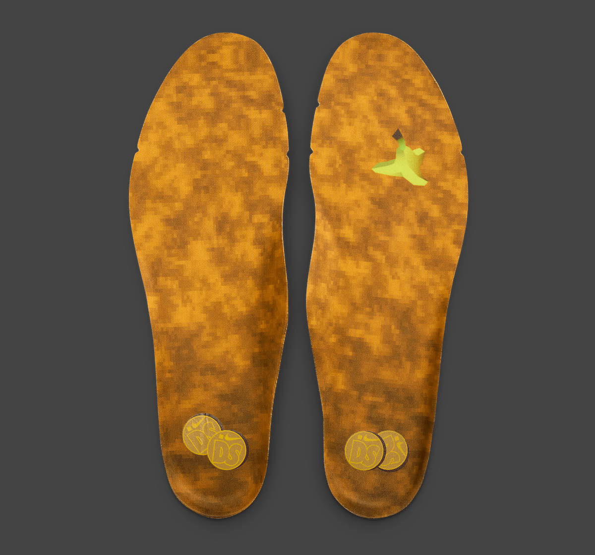 Detailed view of the insoles featuring a banana peel graphic and DS coin.