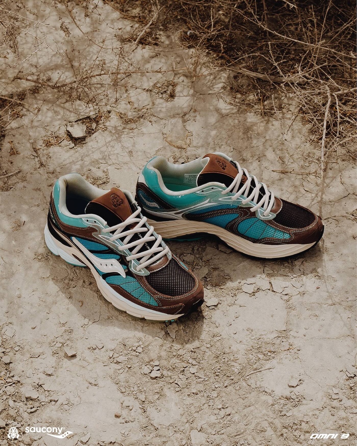 Footpatrol x Saucony ProGrid Omni 9 in blue and brown colorway on rocky terrain