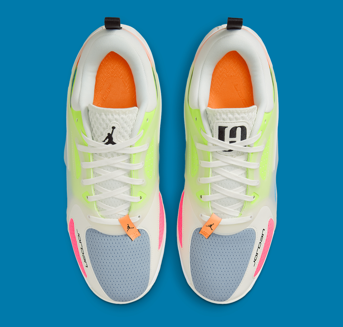 Overhead view of the Jordan Heir 'Neon Multi-Color,' highlighting the asymmetrical lace system, padded tongue, and bold color contrasts.