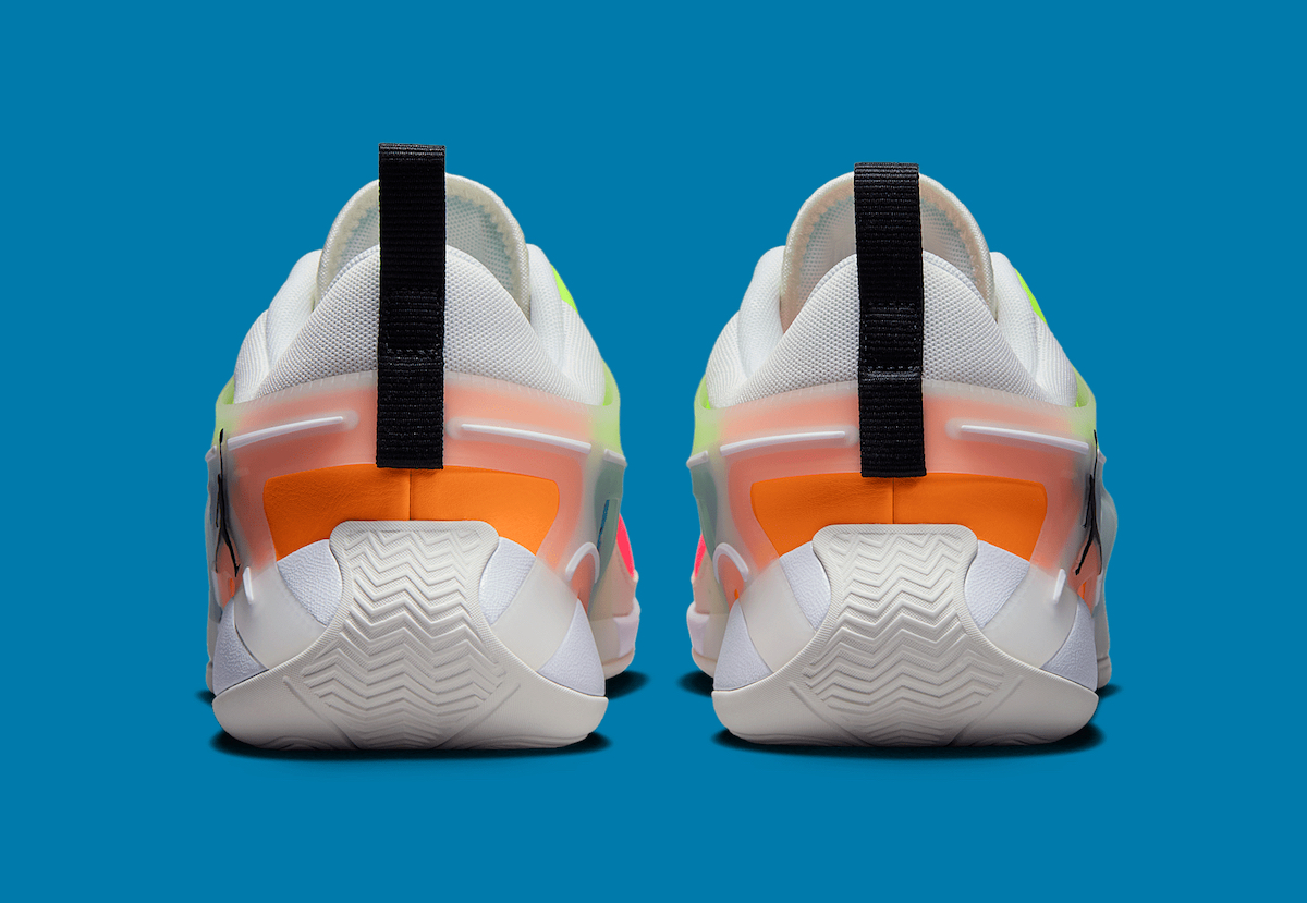 Back view of the Jordan Heir 'Neon Multi-Color,' featuring a translucent heel counter, black pull tabs, and a striking mix of orange and neon green hues.