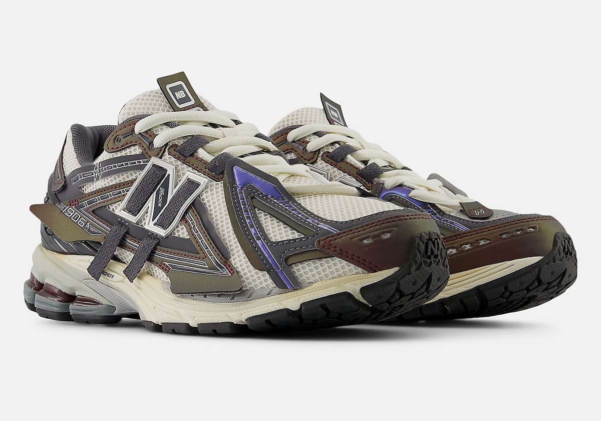 New Balance 1906A with purple and reddish-brown accents, showcasing its deconstructed aesthetic.