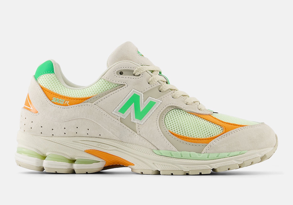 Lateral profile of the New Balance 2002R "Green Apple" highlighting the linen suede upper.