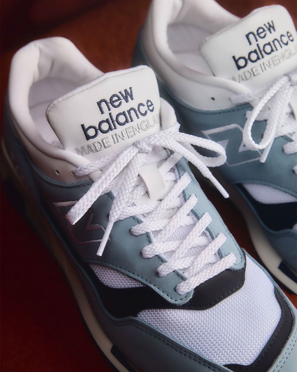 Close-up of the New Balance 1500 Dusty Blue “Made in England” tongue tag