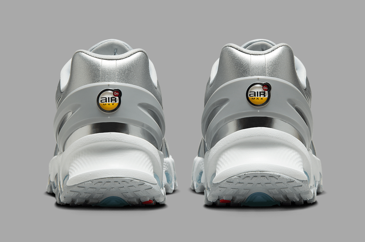 Back view of Nike Air Max Dn8 Wolf Grey/Metallic Silver featuring Air Max logo and heel details.