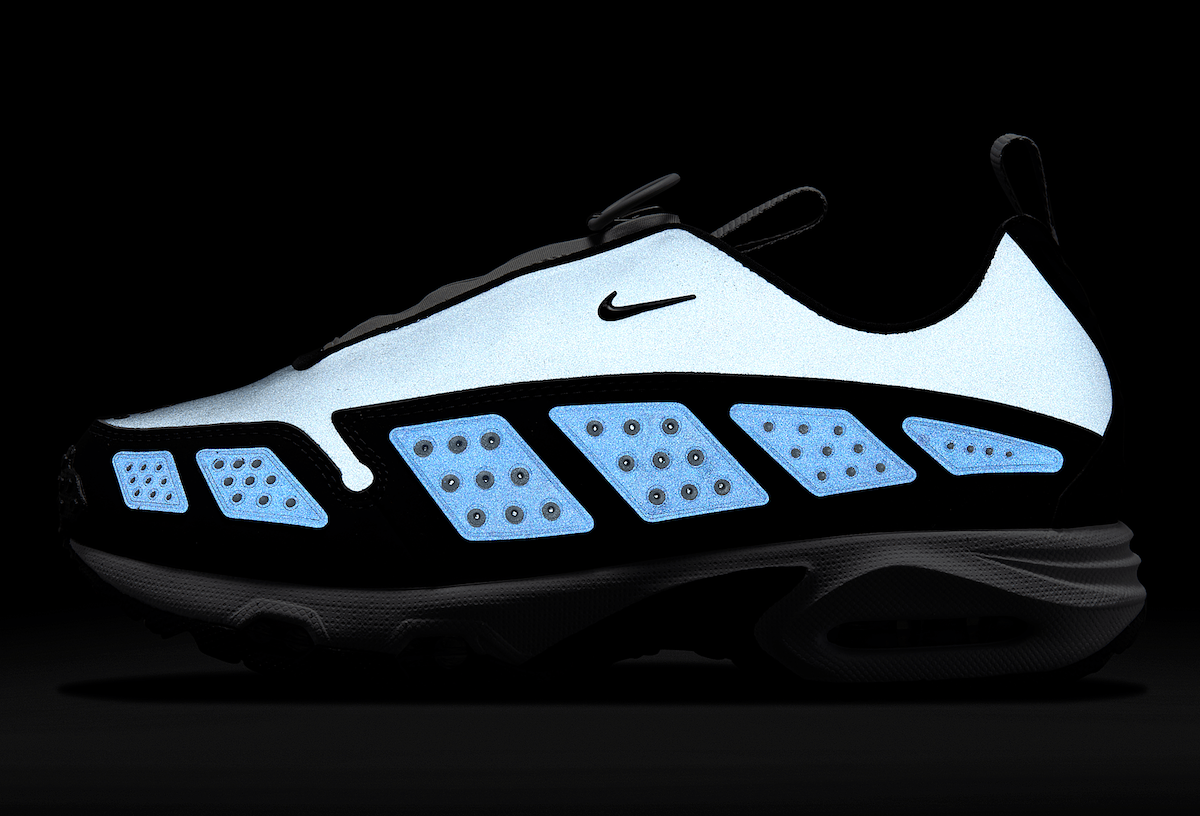 Full reflective glow of Nike Air Max Sunder Silver Reflective under flash lighting