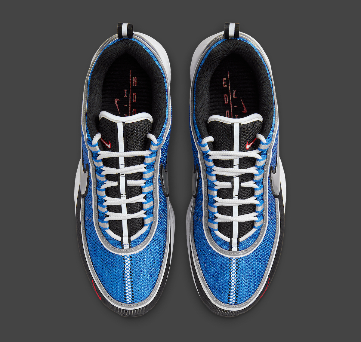 A top-down view of the Nike Air Zoom Spiridon "Signal Blue," showing the detailed lacing system, black tongue, and white midsole.
