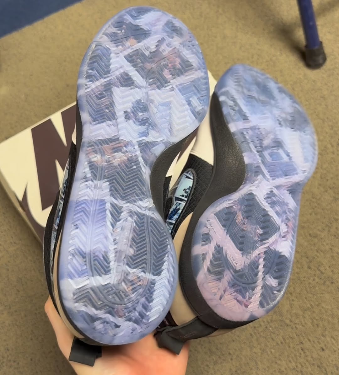 Outsole of Nike Book 1 Archived with icy blue translucent finish and Polaroid graphics