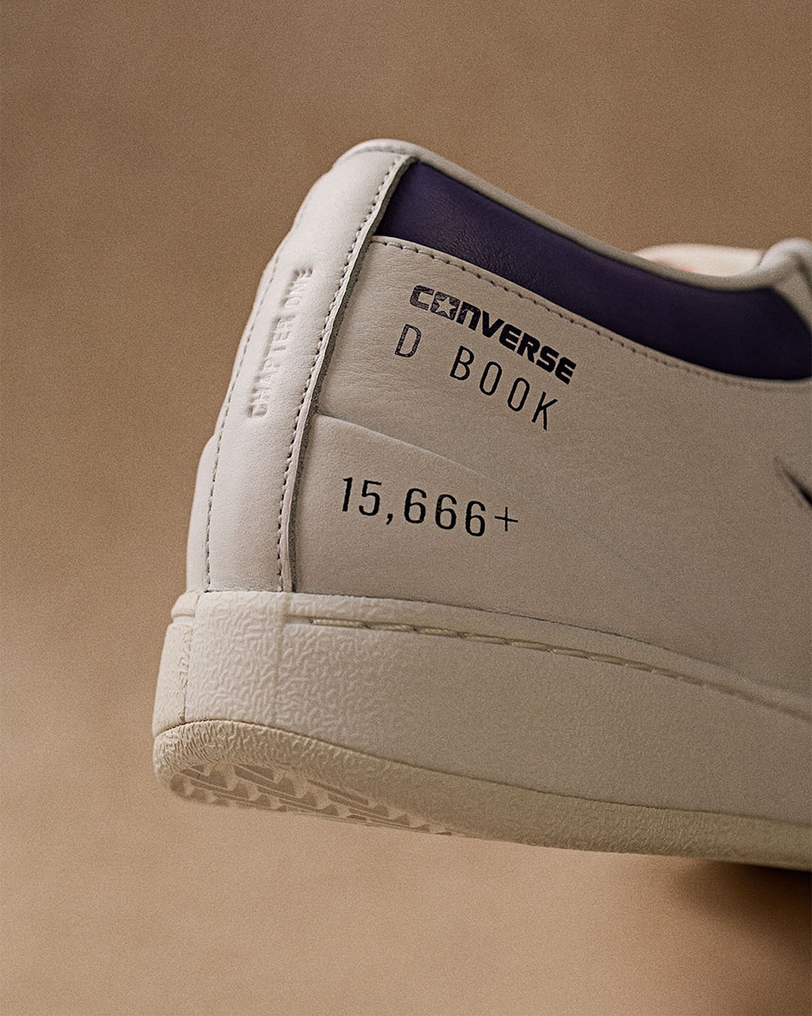 Close-up of "D BOOK" and point total on the Nike Book 1 heel