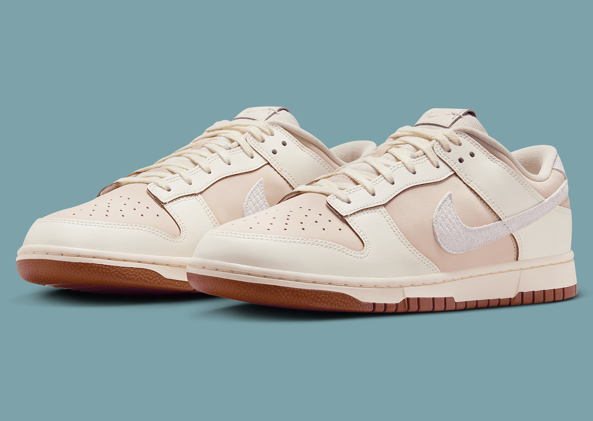 Profile shot highlighting the textured snakeskin Swoosh detail.