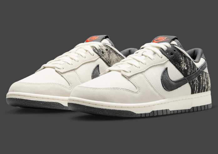 Nike Dunk Low Pale Ivory Off Noir showcasing distressed Off-Noir panels and red branding.