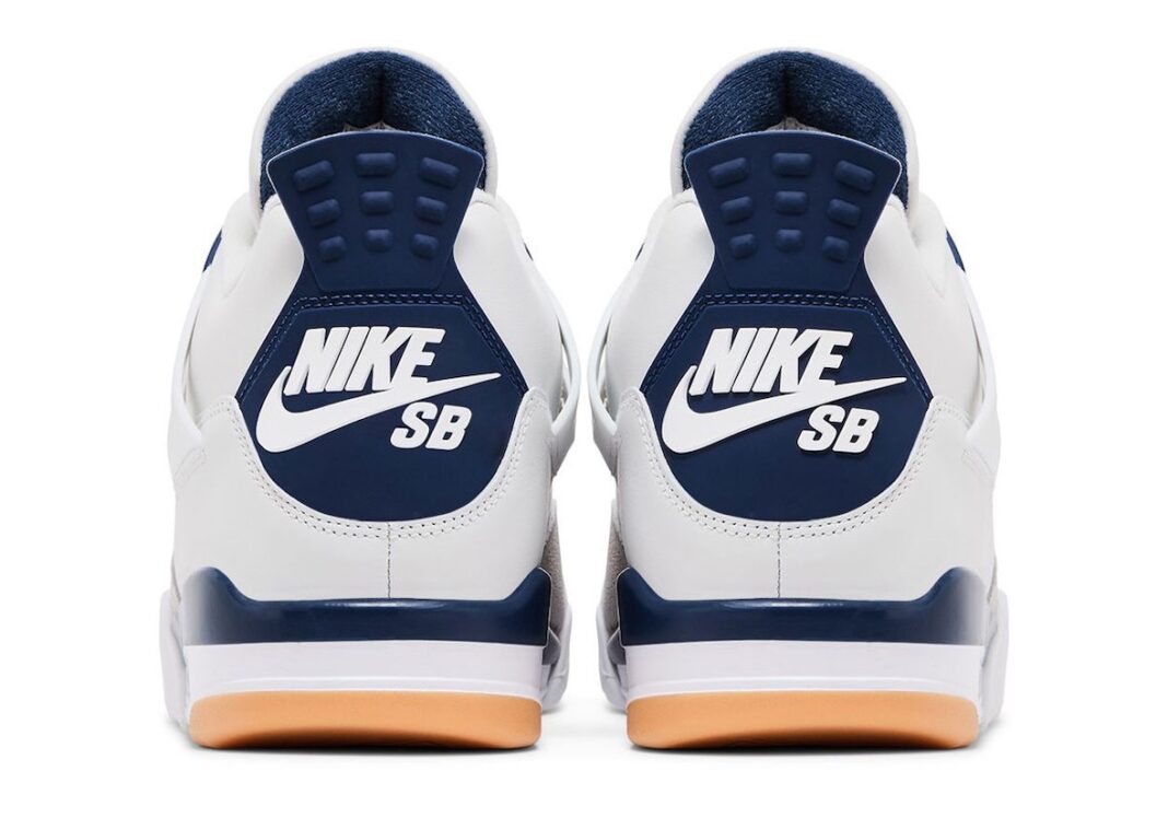 The back of the Nike SB x Air Jordan 4 showcases the bold 'Nike SB' logo in white against a navy heel tab, staying true to its skateboarding influence.