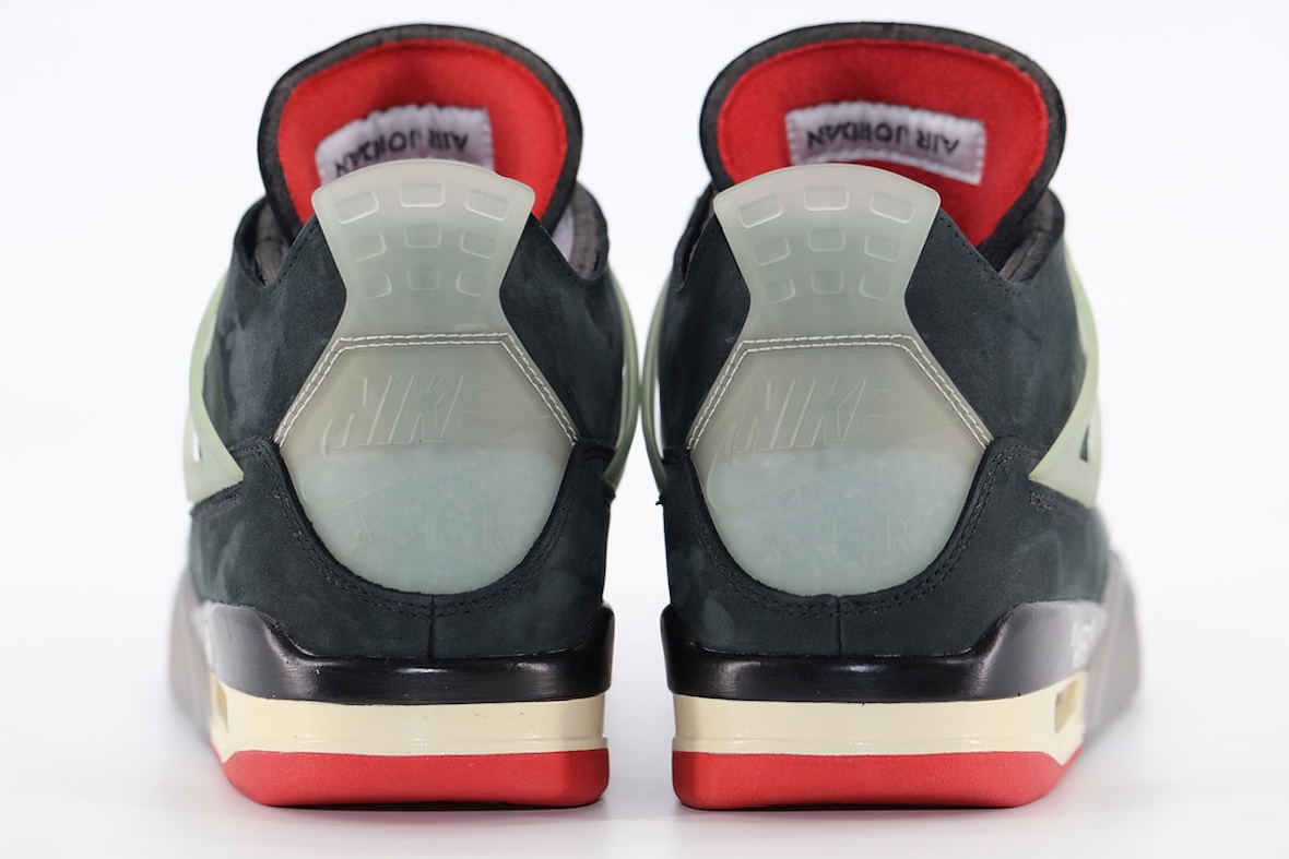 Back view of Off-White x Air Jordan 4 Bred highlighting Nike Air branding and translucent heel tabs