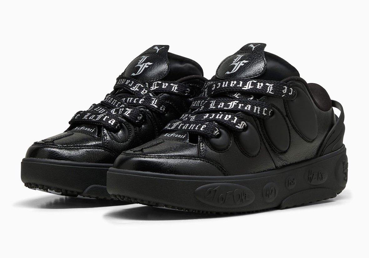 Profile shot of PUMA LaFrance Black highlighting embossed midsole details.