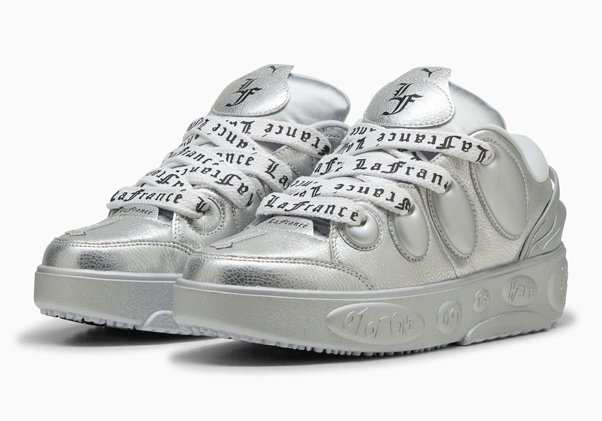 Close-up of PUMA LaFrance Silver sneakers showcasing metallic leather uppers.