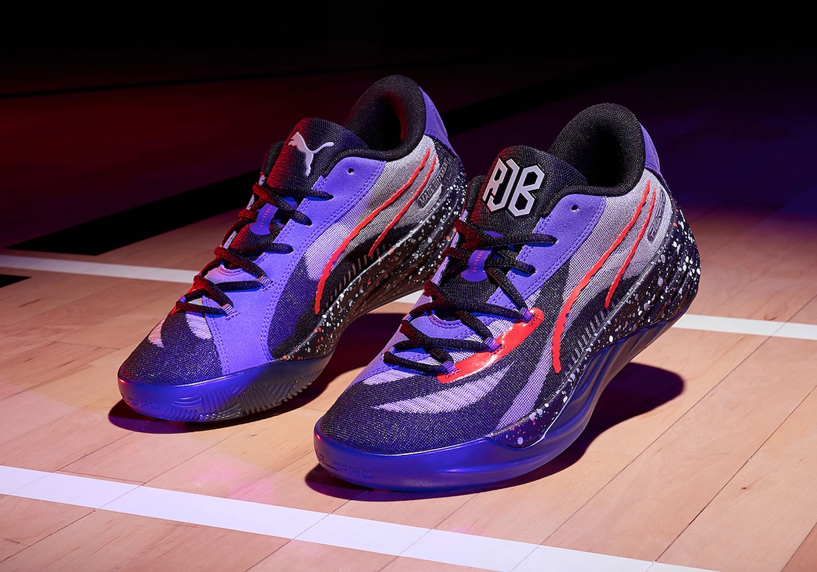 RJ Barrett PUMA All-Pro Nitro PE on basketball court in Raptors-inspired colors