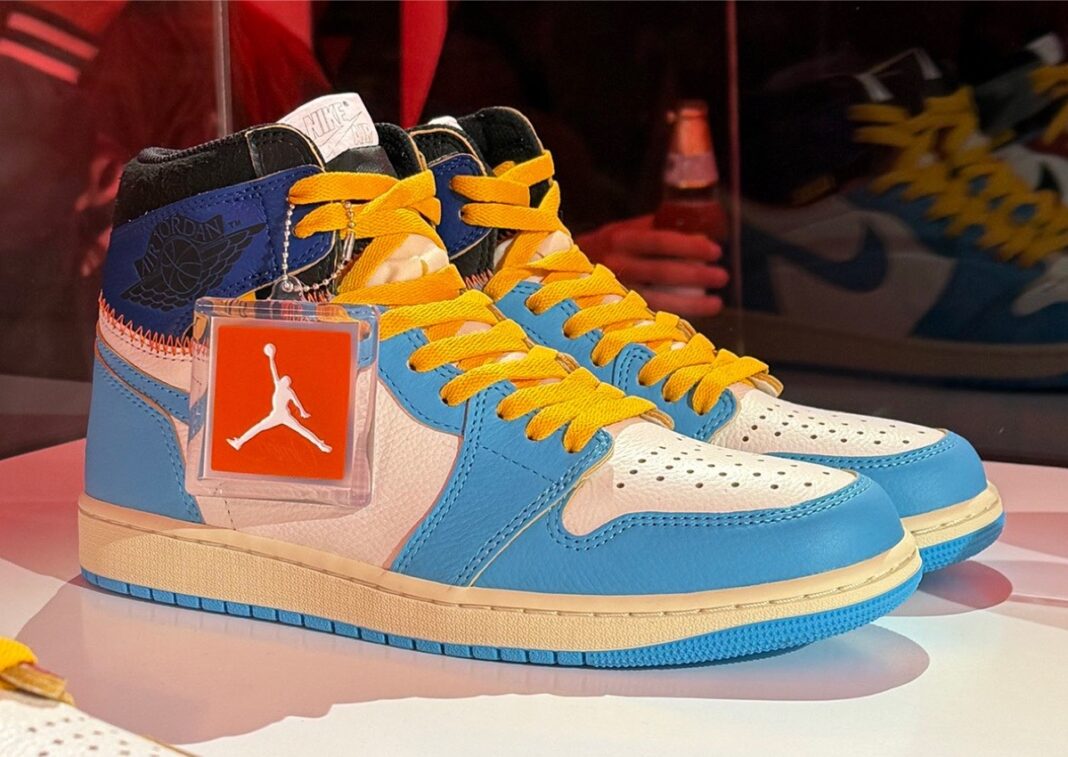 Union x Air Jordan 1 High OG UNC Royal sample sneaker in a vibrant blue and white colorway, featuring yellow laces and a classic Jordan silhouette