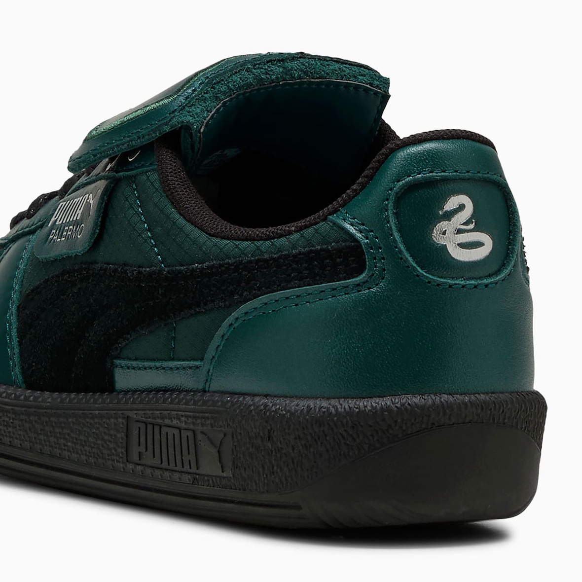 Back heel of the Slytherin Palermo with an embroidered silver snake emblem.