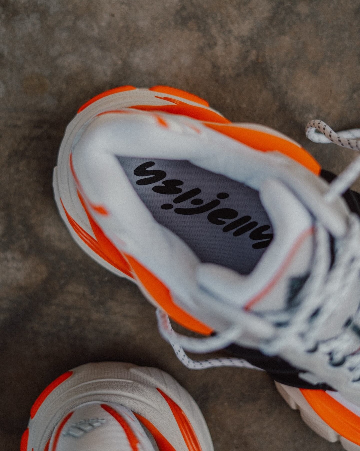 Pharrell x adidas Adistar Jellyfish Insole Branding – A view of the insole featuring Pharrell's handwritten Jellyfish branding, adding a unique touch to the sneaker’s design.