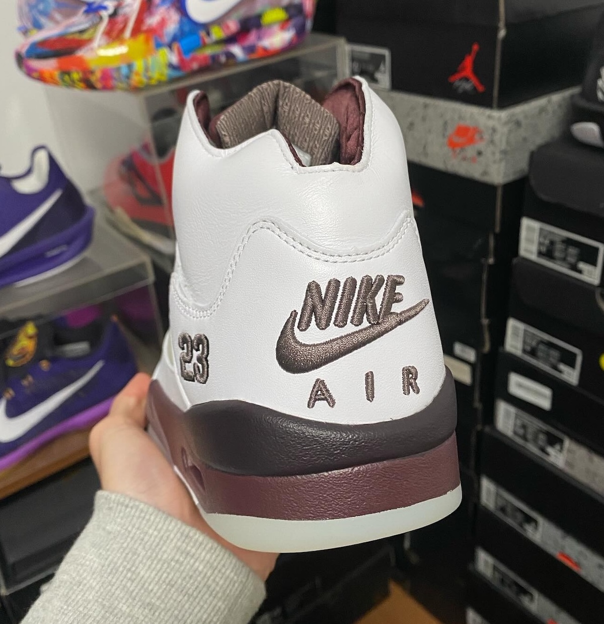 Back view of the sneaker displaying Nike Air branding and “23” embroidery.