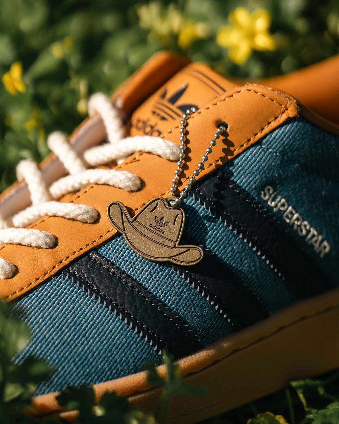 Cowboy hat Trefoil hangtag on the adidas Superstar II sneaker.