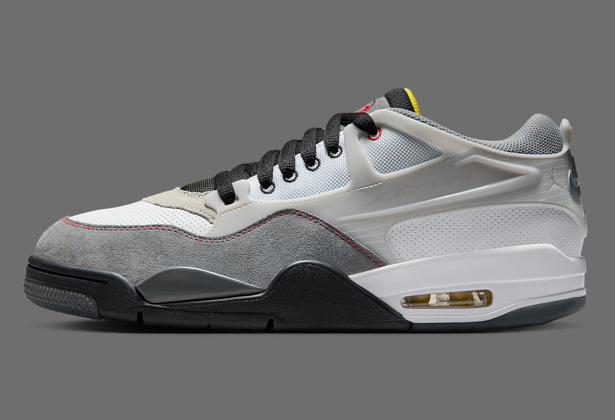 Lateral view of Air Jordan 4 RM Motorsports displaying high-speed aesthetics and perforated leather toe box.