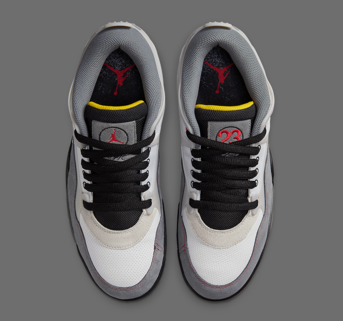 Top-down view of Air Jordan 4 RM Motorsports highlighting Fire Red branding and mesh collar panels.