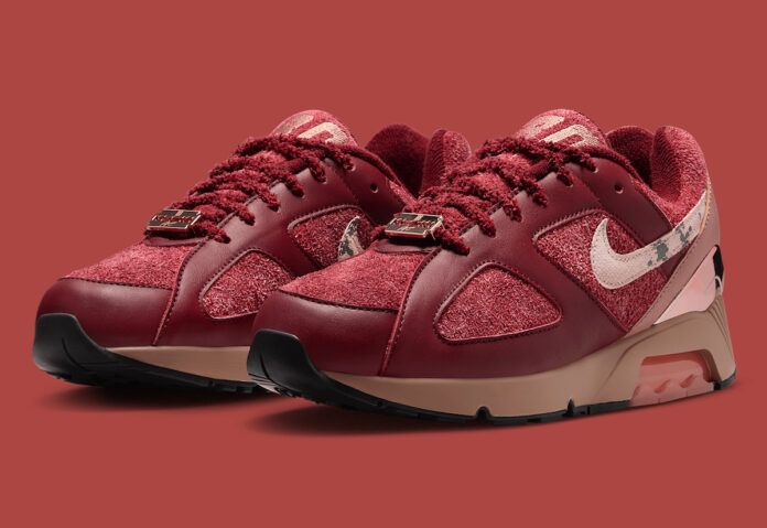 Apron Records x Nike Air 180 'Team Red' sneaker with terry cloth upper and leather overlays.