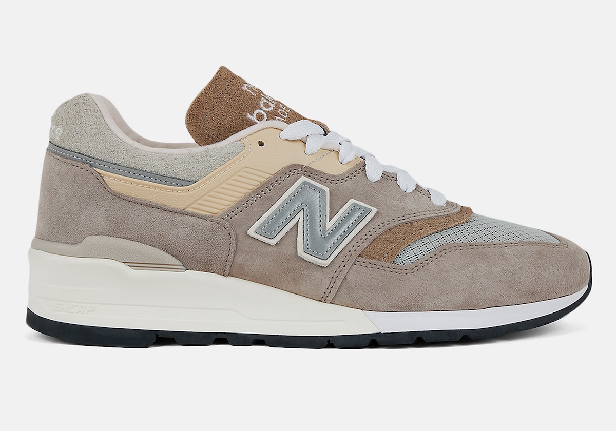 Side profile of the New Balance 997 Light Mushroom with signature NB branding