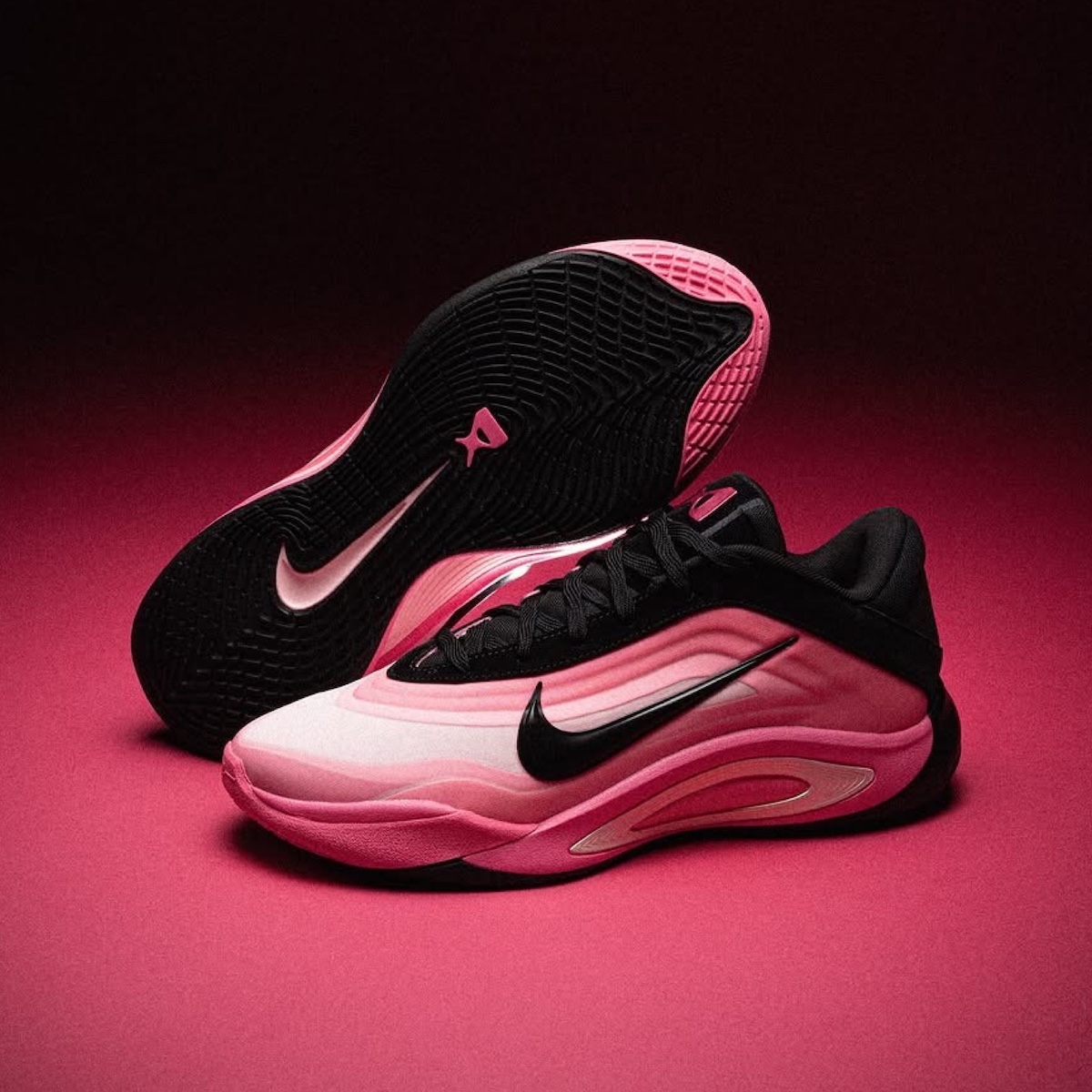 Nike A’One ‘Black/Hyper Pink’ featuring a sleek gradient design with black accents.