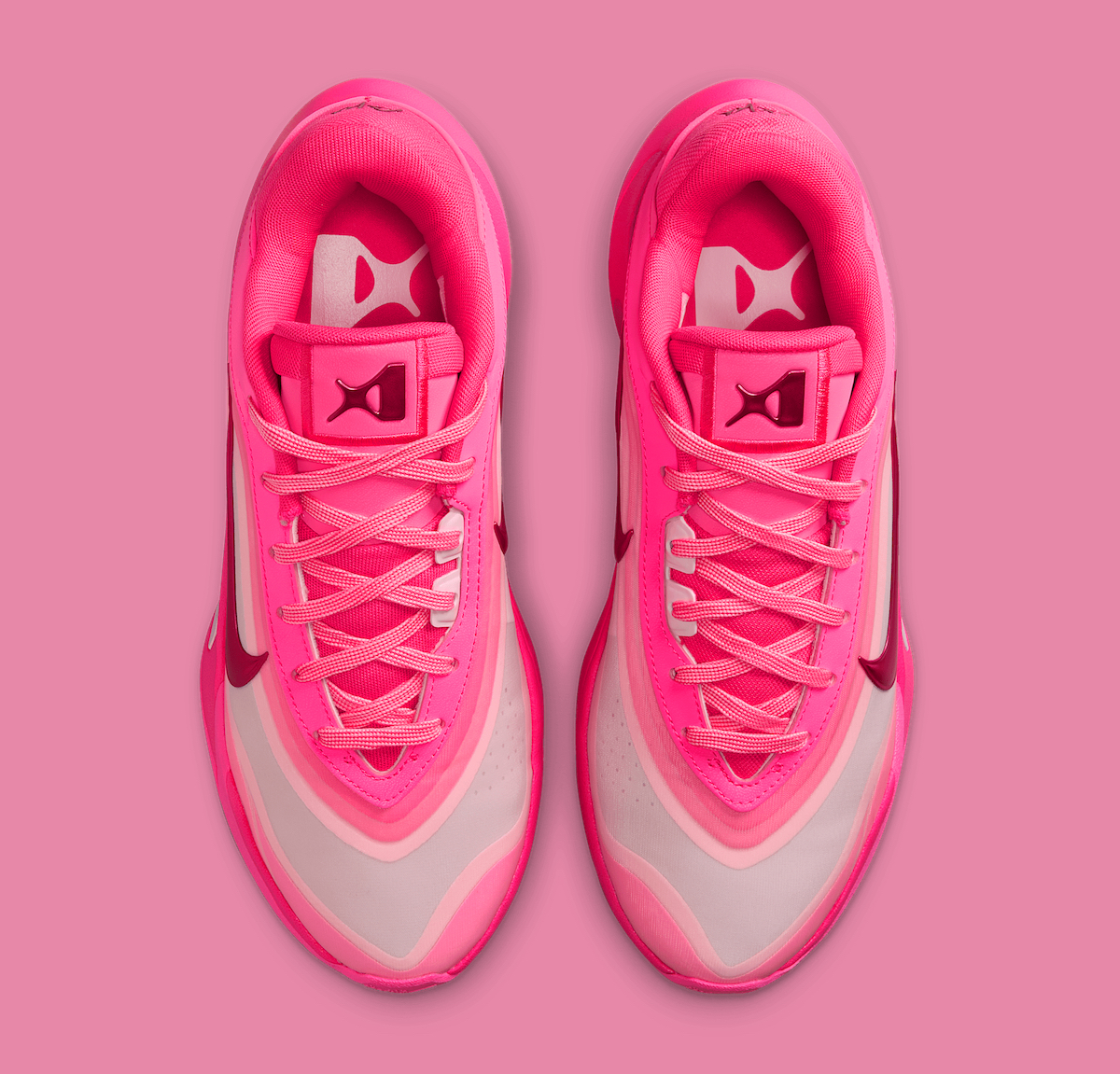 Top-down view of Nike A’One Pink Aura highlighting custom tongue logo and lacing system