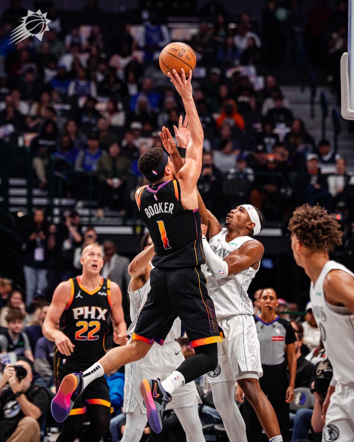 Devin Booker wearing the Nike Book 1 PE during a Suns vs. Mavericks game.