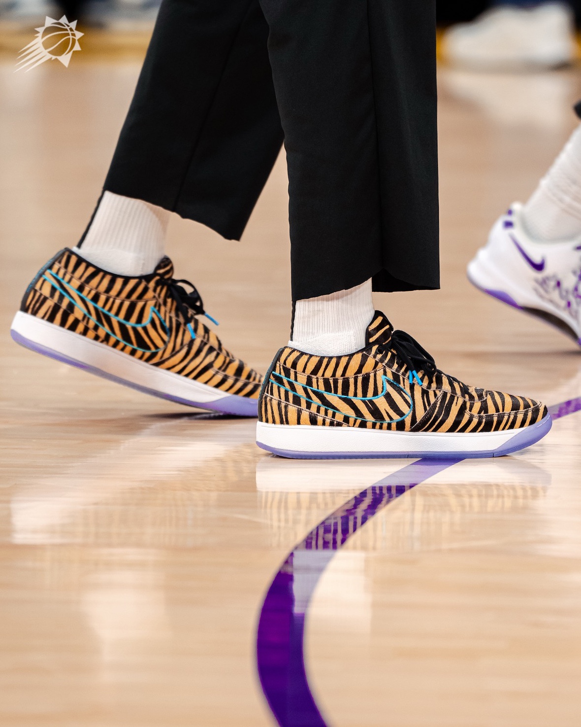 Side view of the Nike Book 1 "Son of Moss Point" PE showcasing the bold tiger-striped design and blue-accented Swoosh