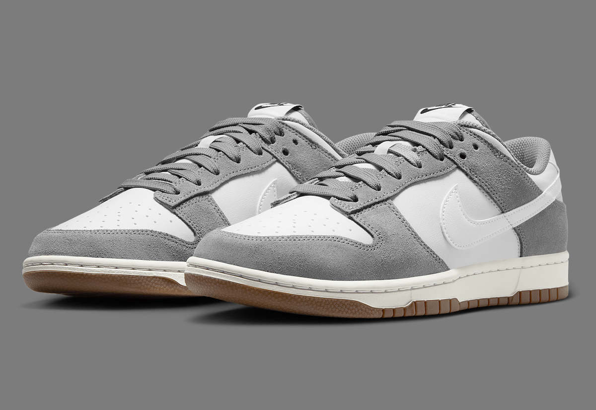 Side-angle view of the Nike Dunk Low "Grey Suede" showcasing its white leather base and grey suede overlays