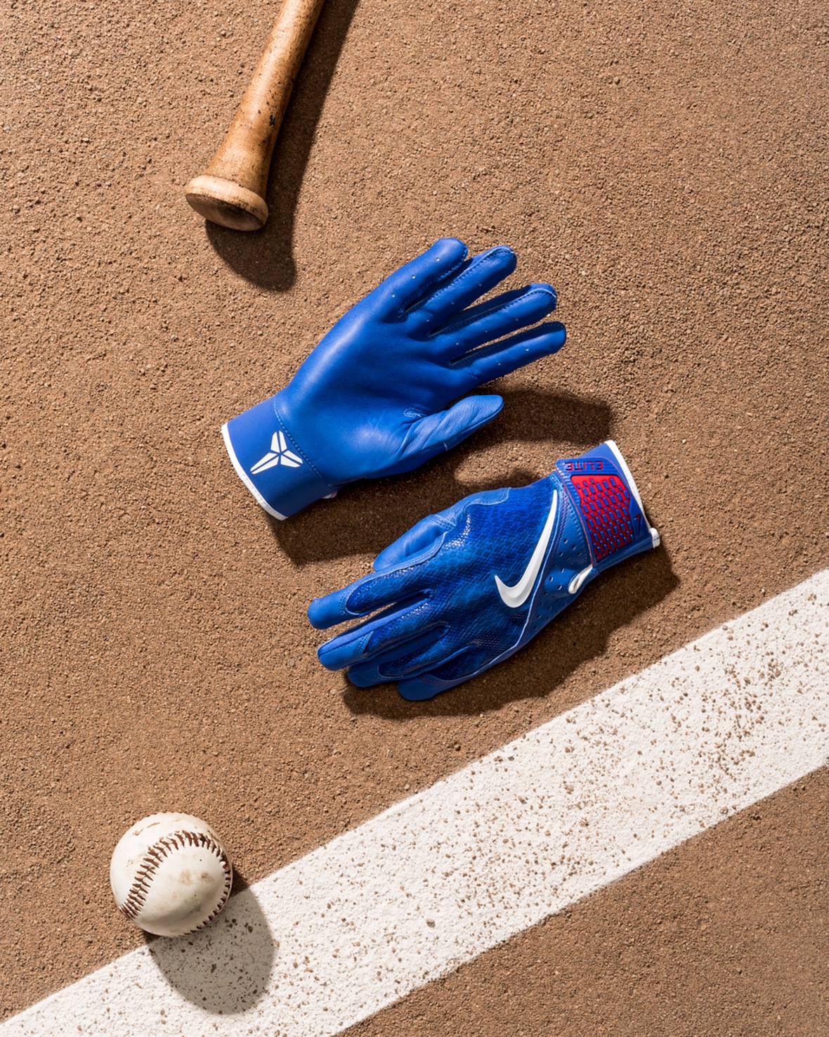 Mamba-theme-blue clashes on a baseball field.