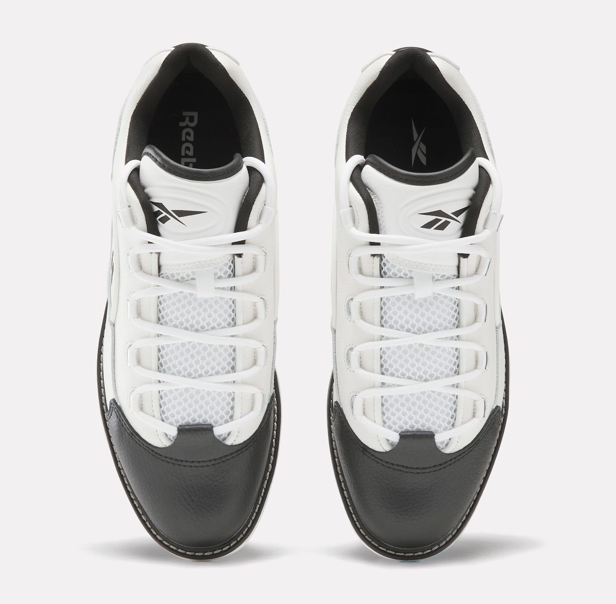 Top-down view of Reebok Question Golf Black Toe with white mesh tongue and laces