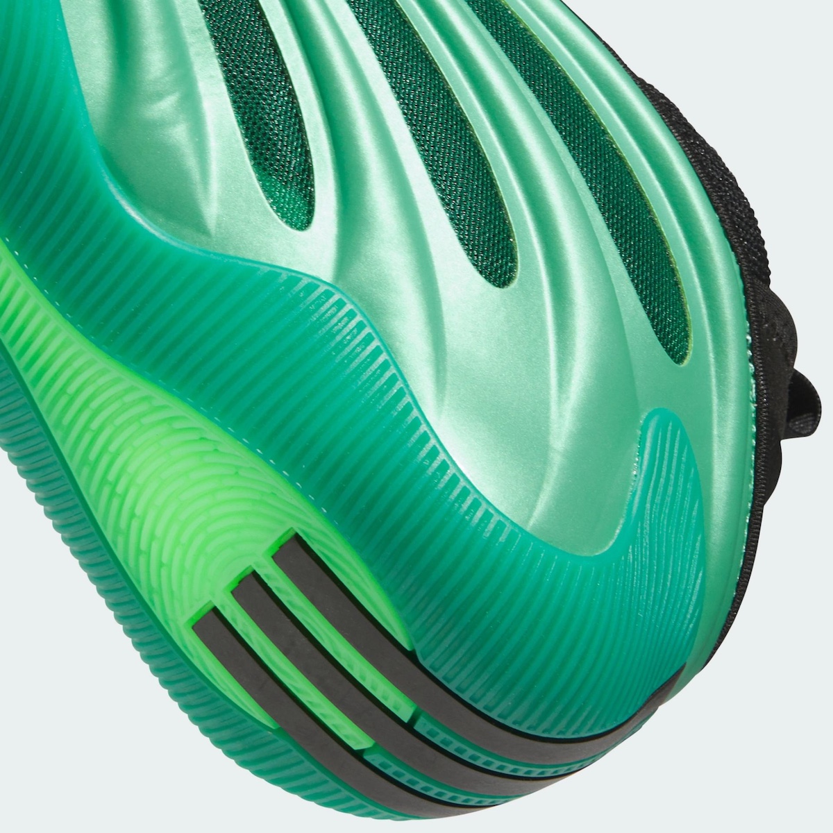 Close-up of the midsole and outsole detailing, emphasizing the shoe’s traction elements.