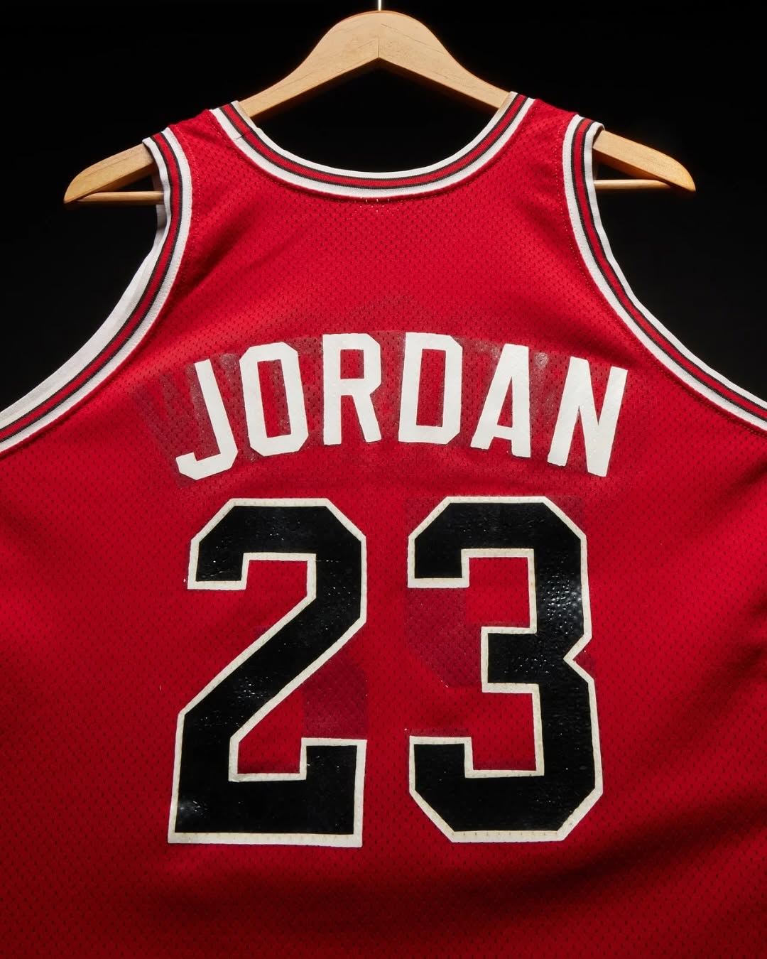 Michael Jordan’s first NBA jersey, repurposed due to 1980s Bulls budget constraints.