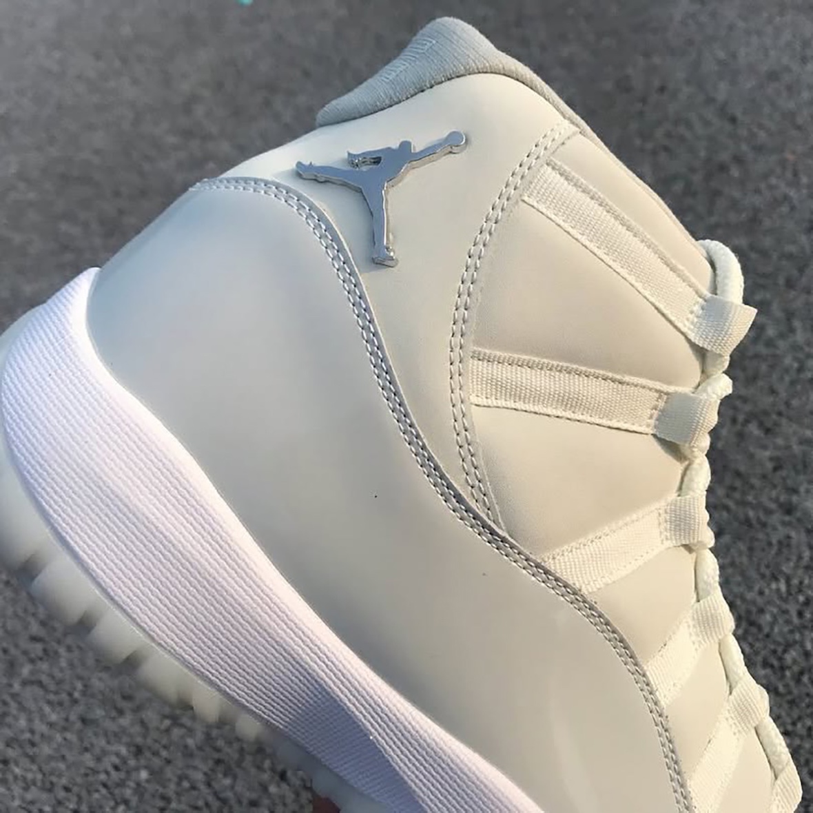 Air Jordan 11 Grand Finale Sail Pearl Grey Jumpman Logo