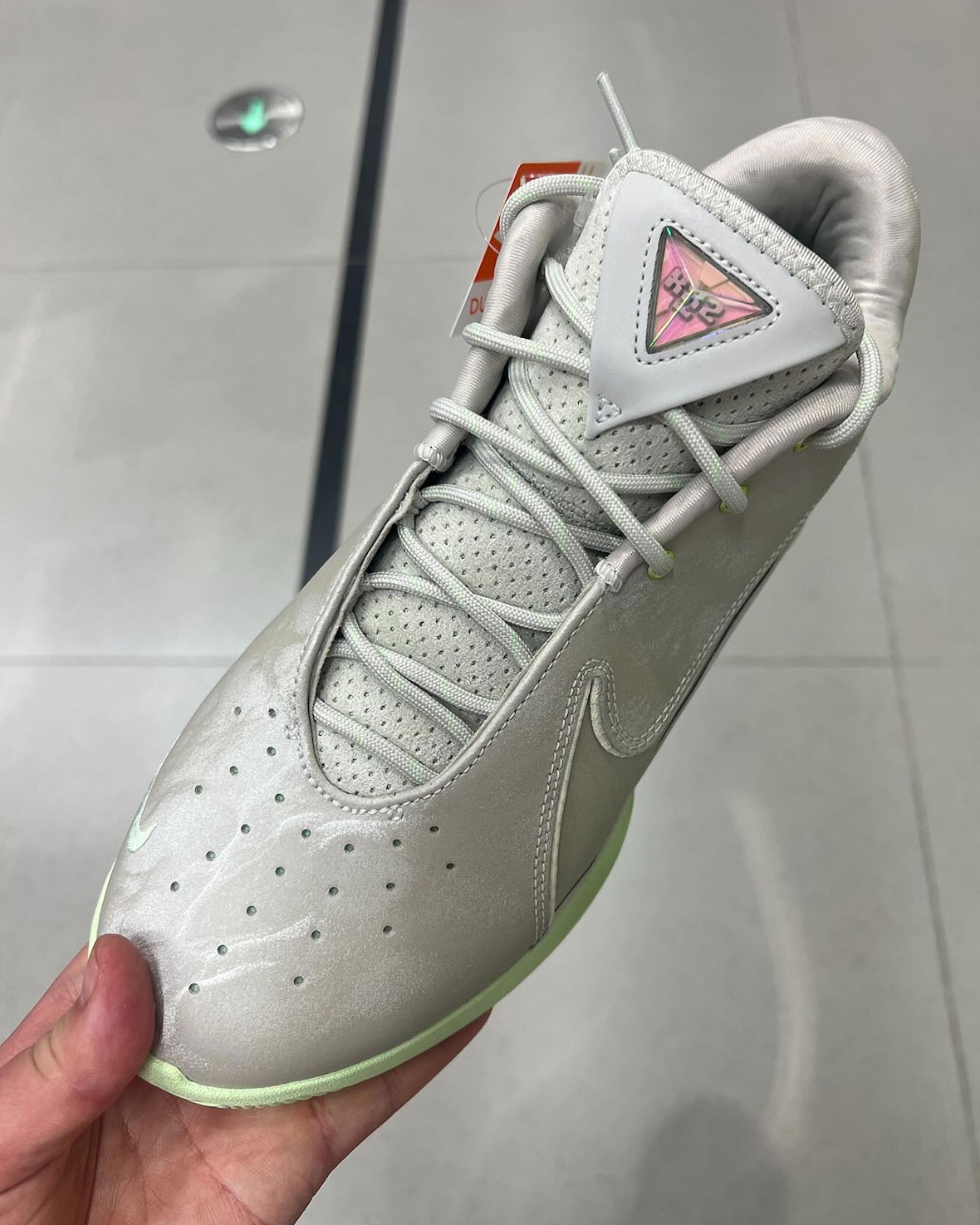 Top view of Nike LeBron 22 Dunkman highlighting mesh tongue, triangle LeBron logo, and smooth pearlized upper.