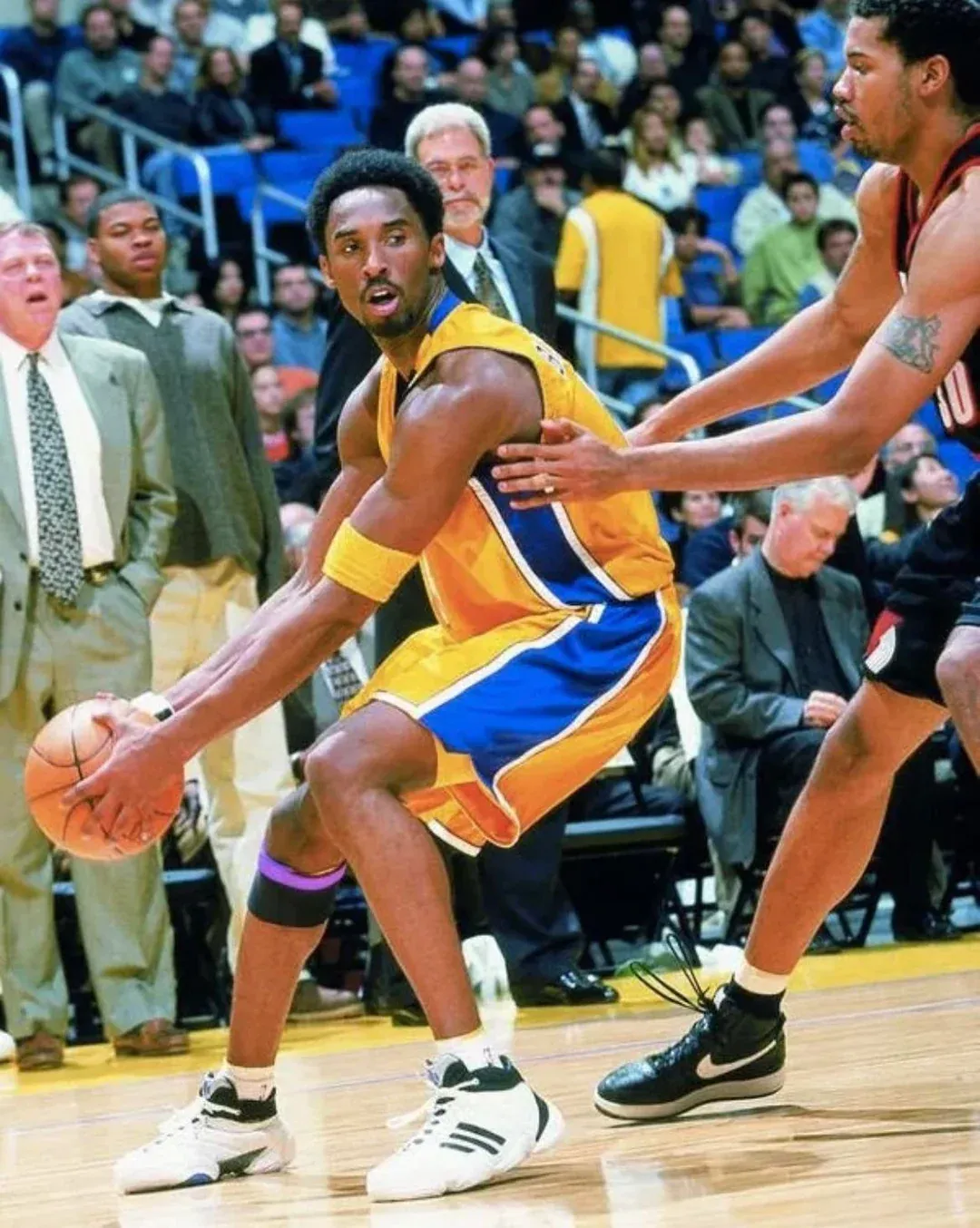 Kobe Bryant wearing the original adidas KB8 III sneakers during an NBA game with the Los Angeles Lakers in the late 1990s.