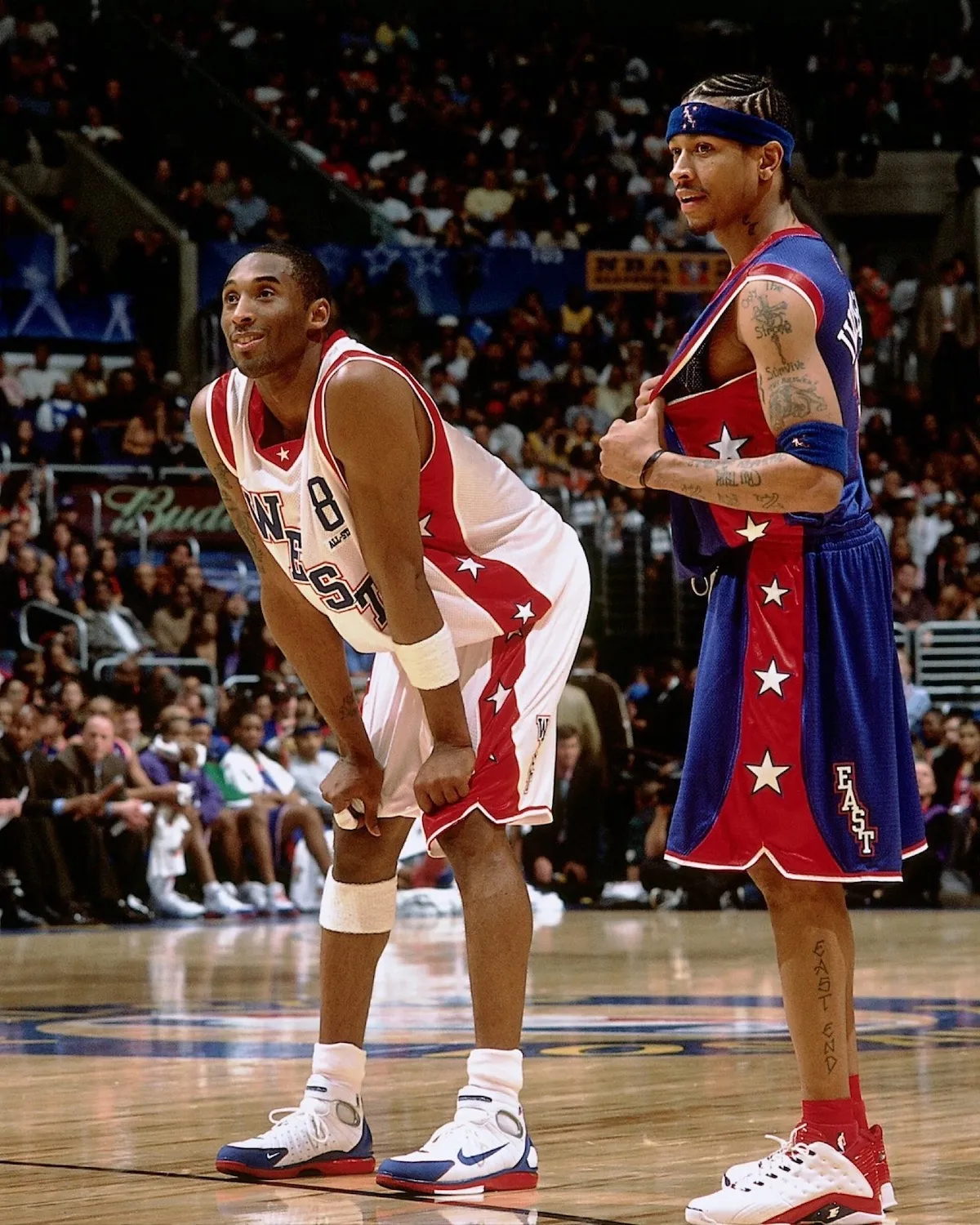 Kobe Bryant wearing Nike Zoom Huarache 2K4 All-Star sneakers next to Allen Iverson during the 2004 NBA All-Star Game.