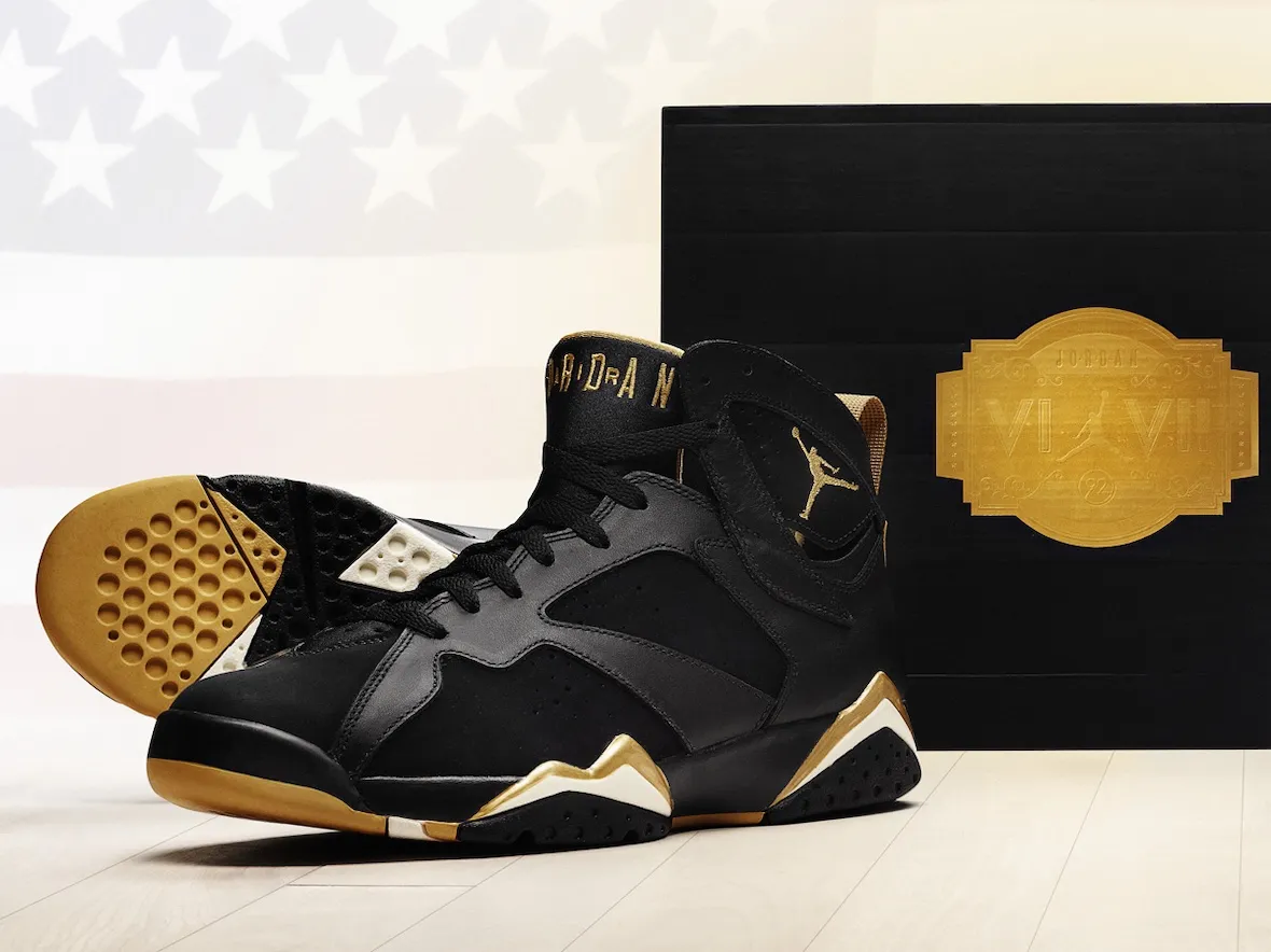 Air Jordan 7 Golden Moments black and gold sneaker with premium packaging and Olympic-inspired detailing