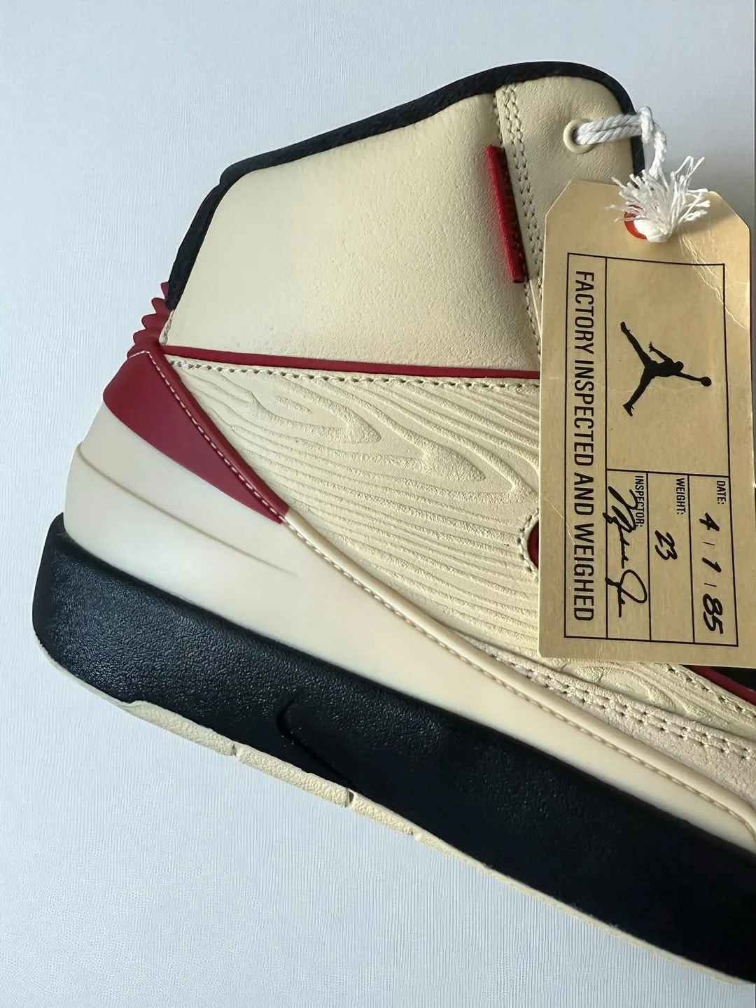 Air Jordan 2 PE with Factory Inspected and Weighed hang tag, inspired by Louisville Slugger baseball bats.