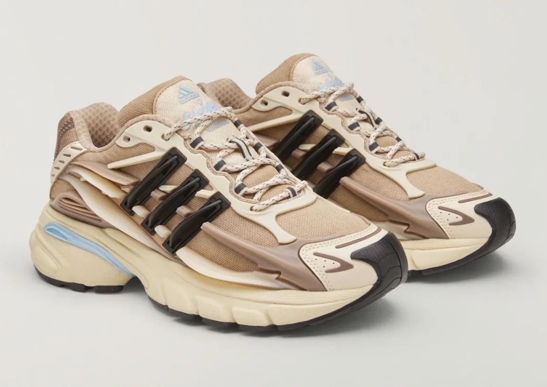 Pharrell x adidas Jellyfish in Crystal Sand colorway, showing beige and light blue upper with oversized silhouette - detail view 1