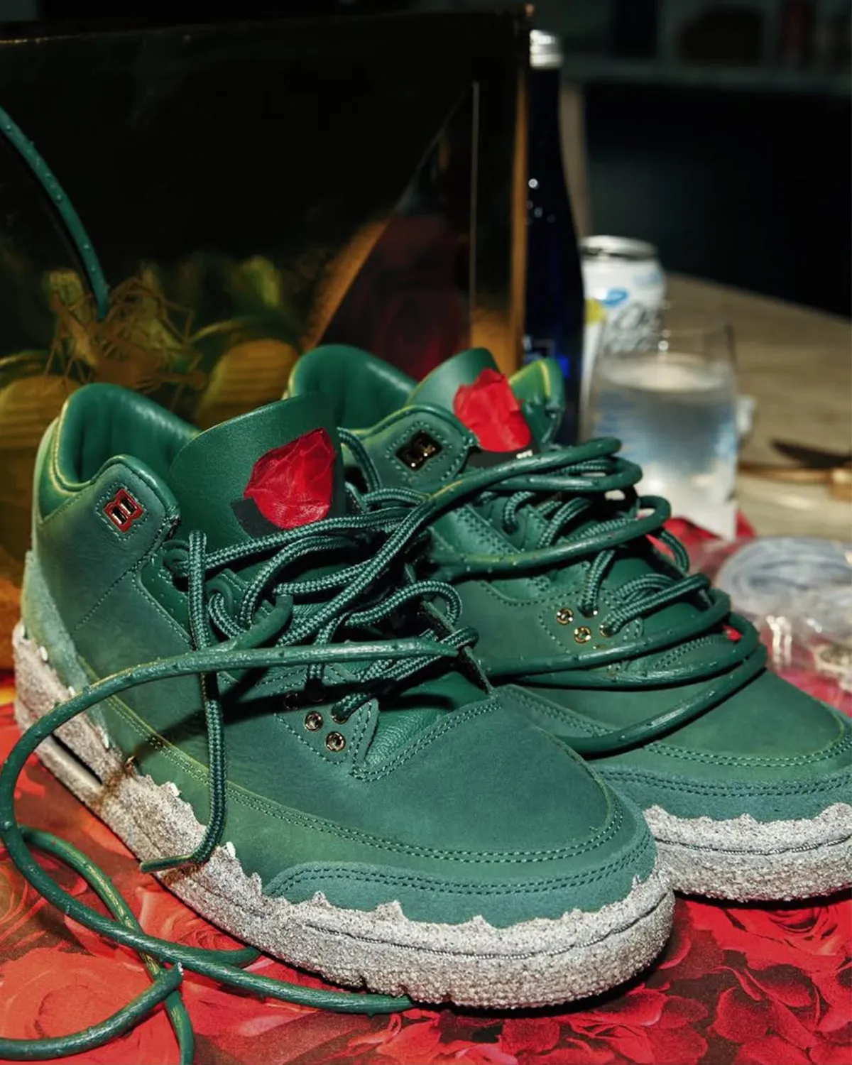 Teyana Taylor x Air Jordan 3 Concrete Rose with removable rose thorns attached on the tongue